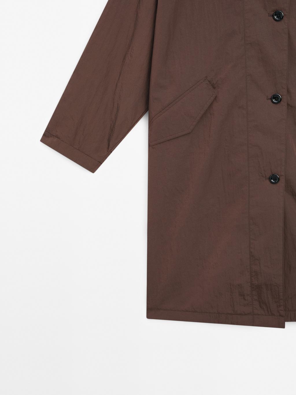 Oversize flowing trench coat in water-repellent fabric