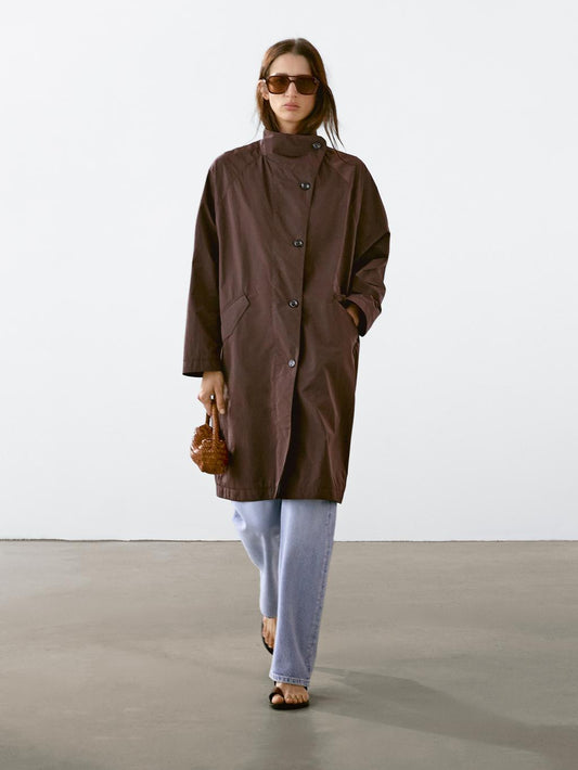 Oversize flowing trench coat in water-repellent fabric