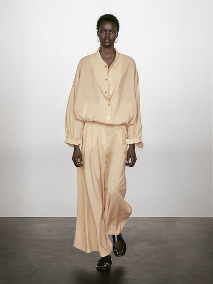 Loose-fitting bomber jacket with drawstring detail