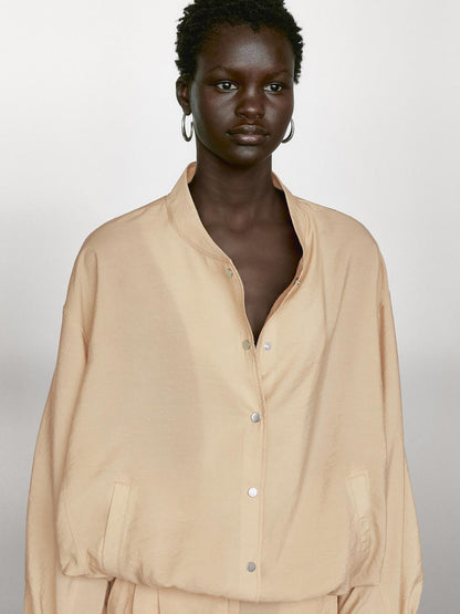 Loose-fitting bomber jacket with drawstring detail