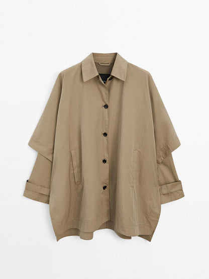 Cape trench coat with long sleeves