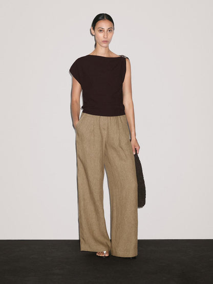 Draped neckline top with brooch detail