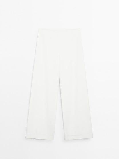High-waist palazzo trousers - STUDIO
