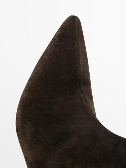 Heeled split leather boots