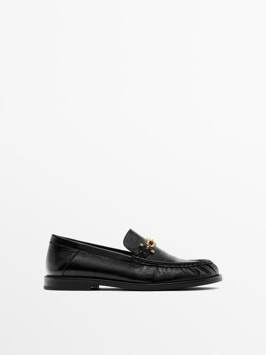 Crackled leather loafers with decorative detail