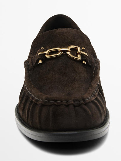 Split suede loafers with metal applique