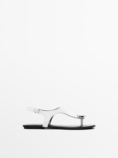 Flat leather sandals with embellished detail